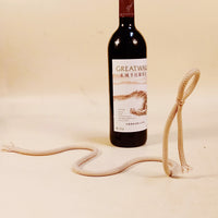 Load image into Gallery viewer, Suspended Rope Wine Bottle